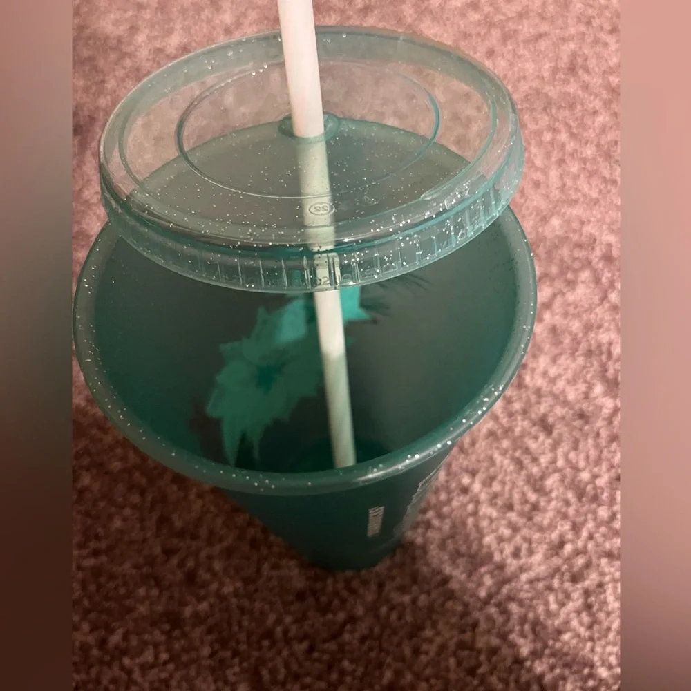 Starbucks 24oz Poinsettia Green Holiday Glitter Tumbler with Lid and Straw